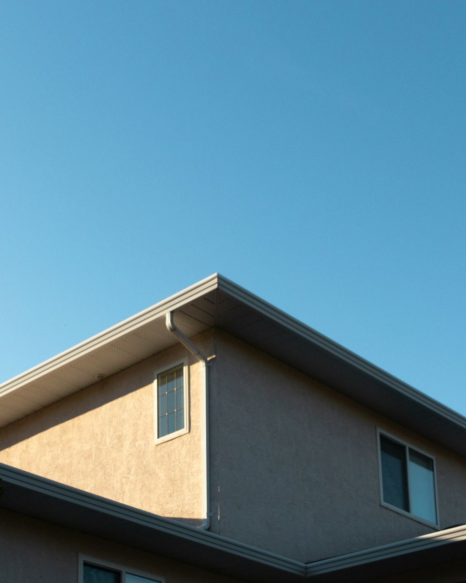 Seamless gutters installed along both rooflines of a Bristol home
